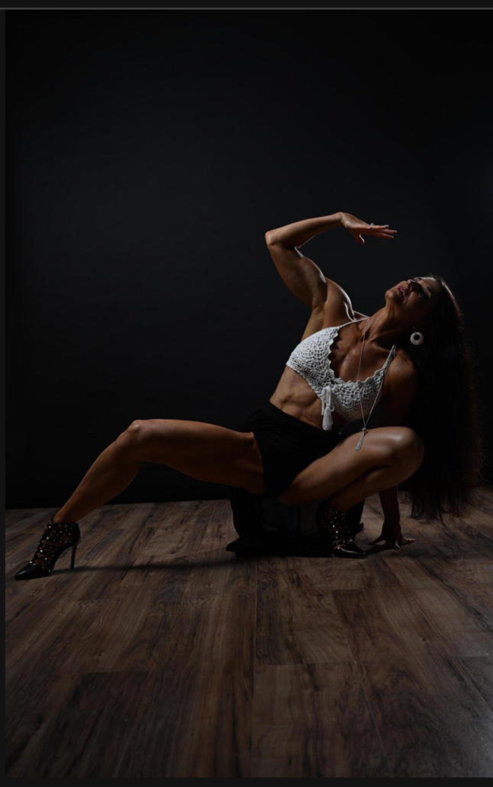 Strong, Radiant, Reconnected Strong, Radiant, Reconnected. Woman posing in dynamic move.